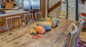farmers table with pumpkins