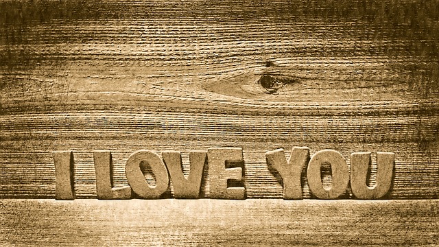 A True Measure of Happiness--wood carved "I love you"