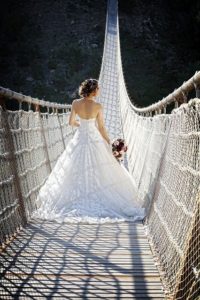 Say Yes to the Best--bride in wedding dress on a bridge