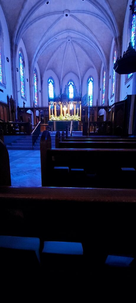 The lighted altar, including a celtic cross at the Cathedral of St Phillip in Atlanta.