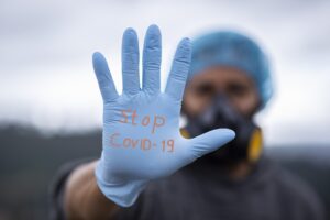 A Birthday to Remember--Medical person with glove "Stop, Covid-19"