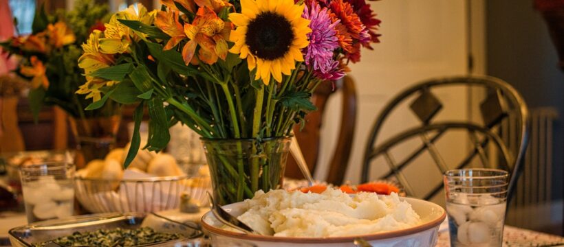 The Best Meal of the Year--food and cut flowers on a table